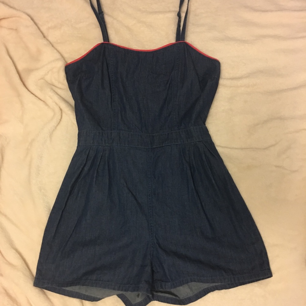 Cute denim colored romper with red details